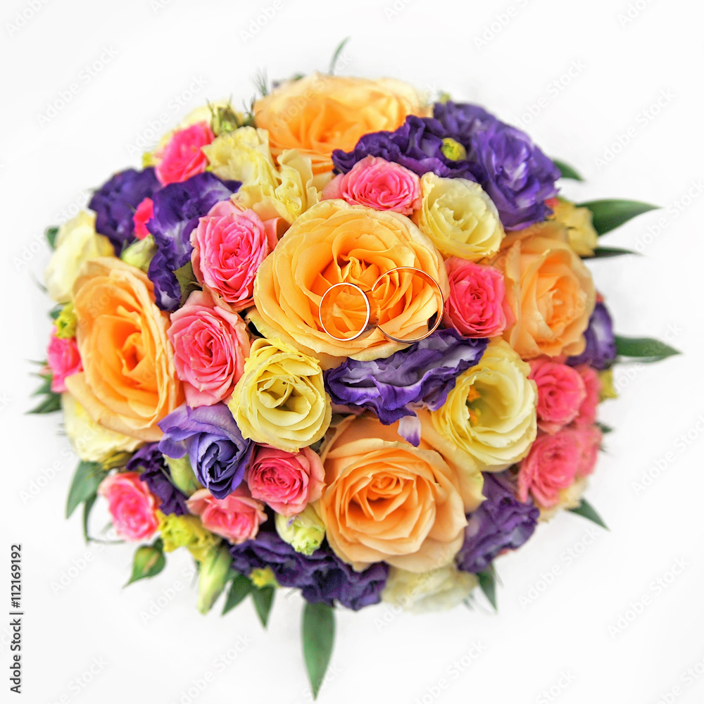colorful rose bouquet with golden wedding rings colorful rose bouquet with golden wedding rings