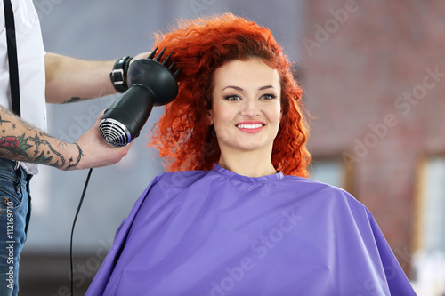 Beautiful girl visit hairdr...