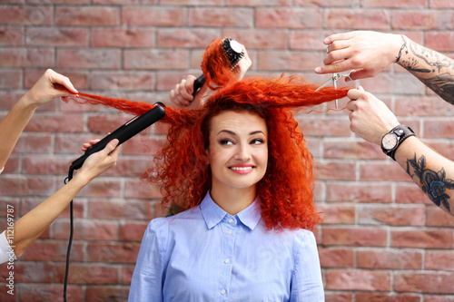 Red haired beautiful girl w...