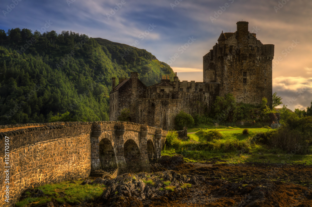 Eilean Donan Castle and bridge in sunset light, Highland, Scotland