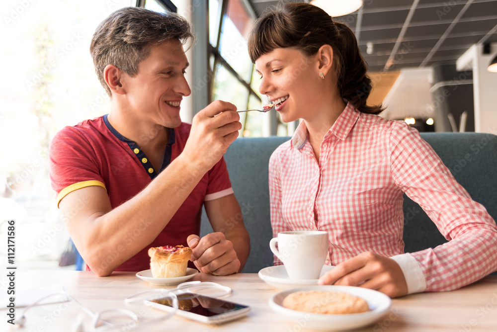 two lovers chatting and having fun in the cafe two lovers chatting and having fun in the cafe