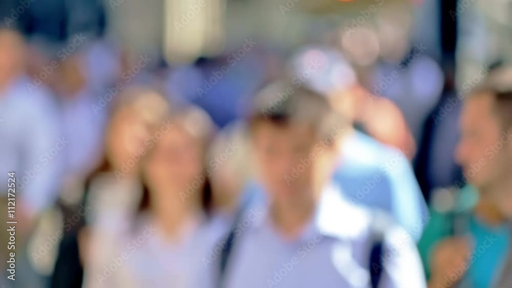 Anonymous crowd commuters unrecognisable group of people walking bright colours blurry background New York City sunny slow motion Anonymous crowd commuters unrecognisable group of people walking bright colours blurry background New York City sunny slow motion