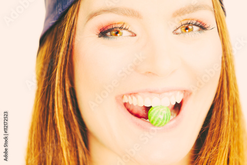 Attractive girl chewing gum.