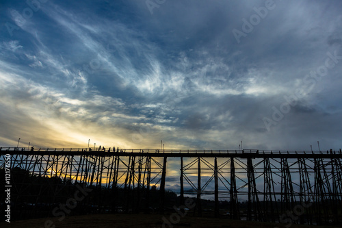 Black silhouette of the wooden bridge in Kanjanaburi province, Thailand