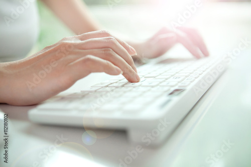 business woman hand typing on laptop keyboard