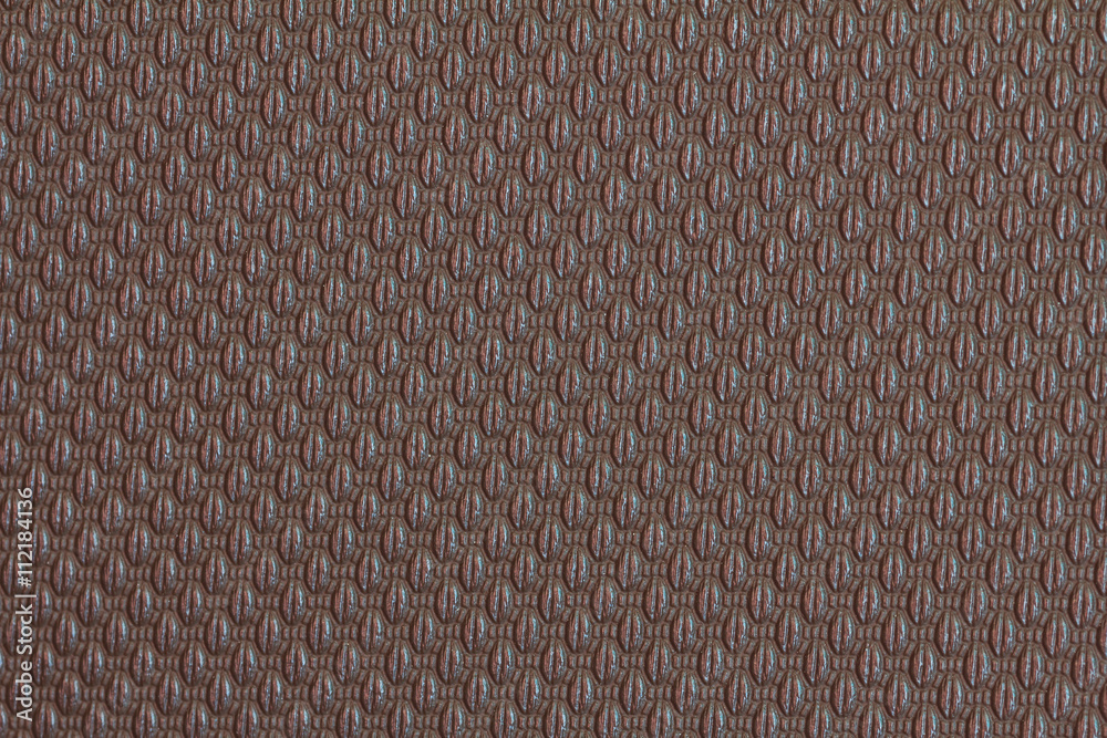 Abstract background texture of brown leatherette. Brown leatherette bag. Brown leatherette for design with copy space for text or image.