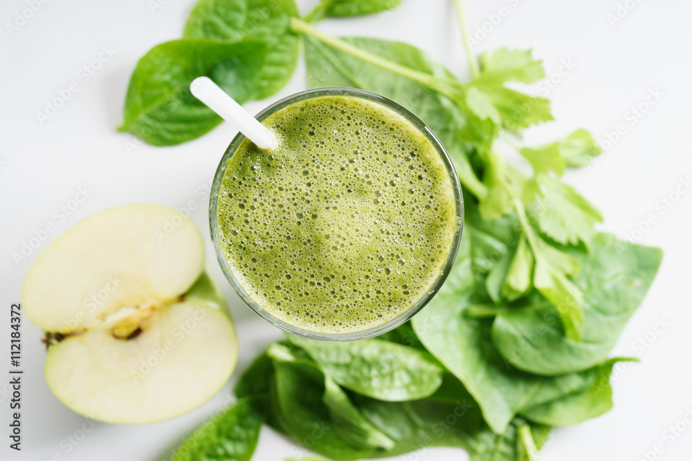 glass of fresh green spinach and kale healthy smoothie glass of fresh green spinach and kale healthy smoothie