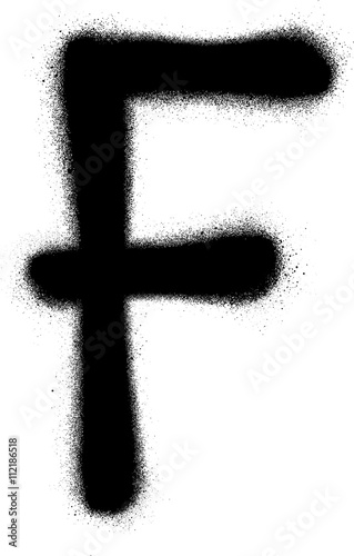 sprayed F font graffiti in black over white