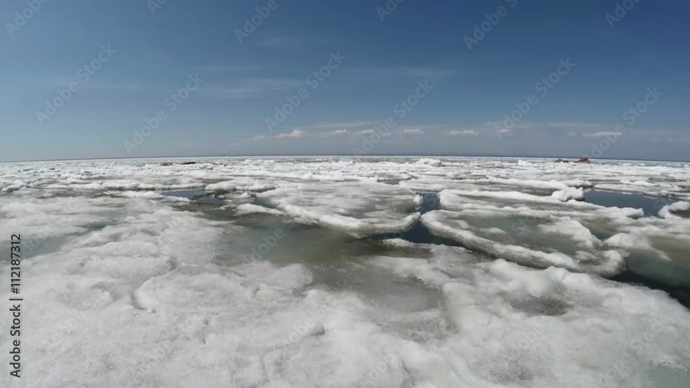 Breaking the Ice on a Large Lake,
Spring break up on Lake Baikal, the movement of the ice, Shooting from a helicopter Breaking the Ice on a Large Lake,
Spring break up on Lake Baikal, the movement of the ice, Shooting from a helicopter