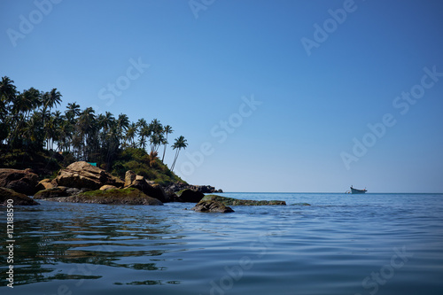 landscape of tropical beach with rocks