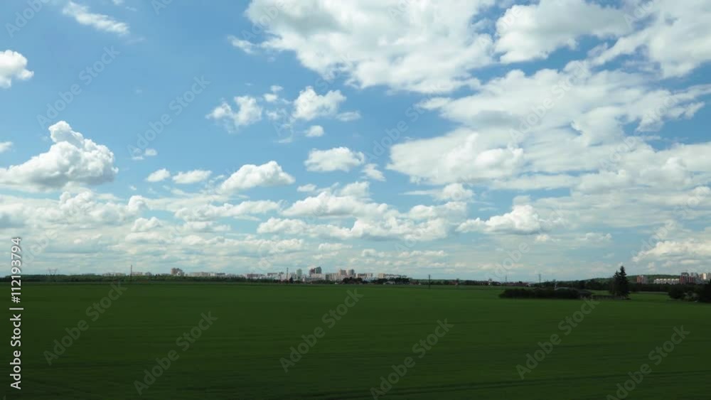 Time-lapse of cityscape with beautiful cloudy sky