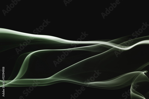 Real photographed abstract smoke on black background.