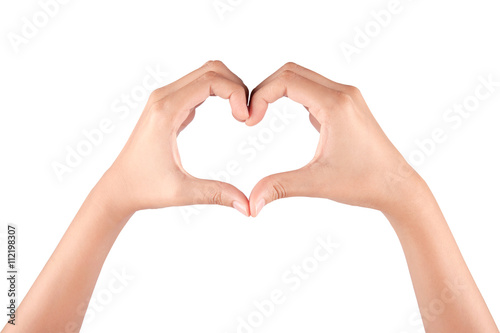 Female hands in the form of heart