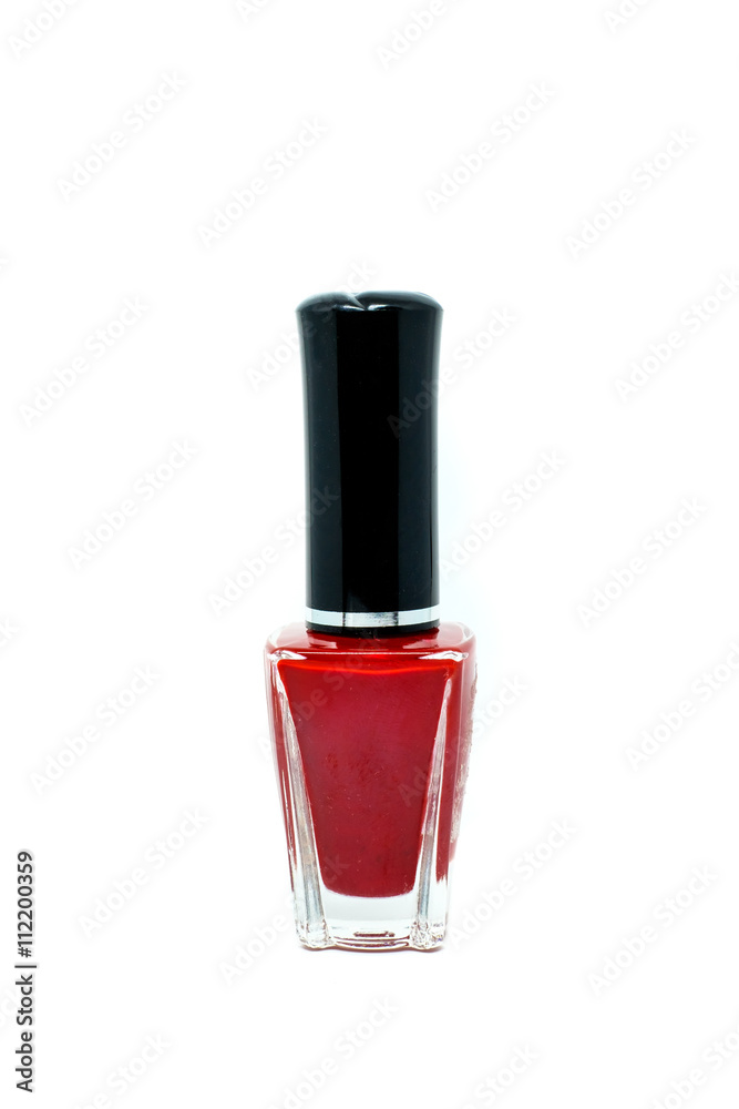 red nail polish bottle on white background red nail polish bottle on white background