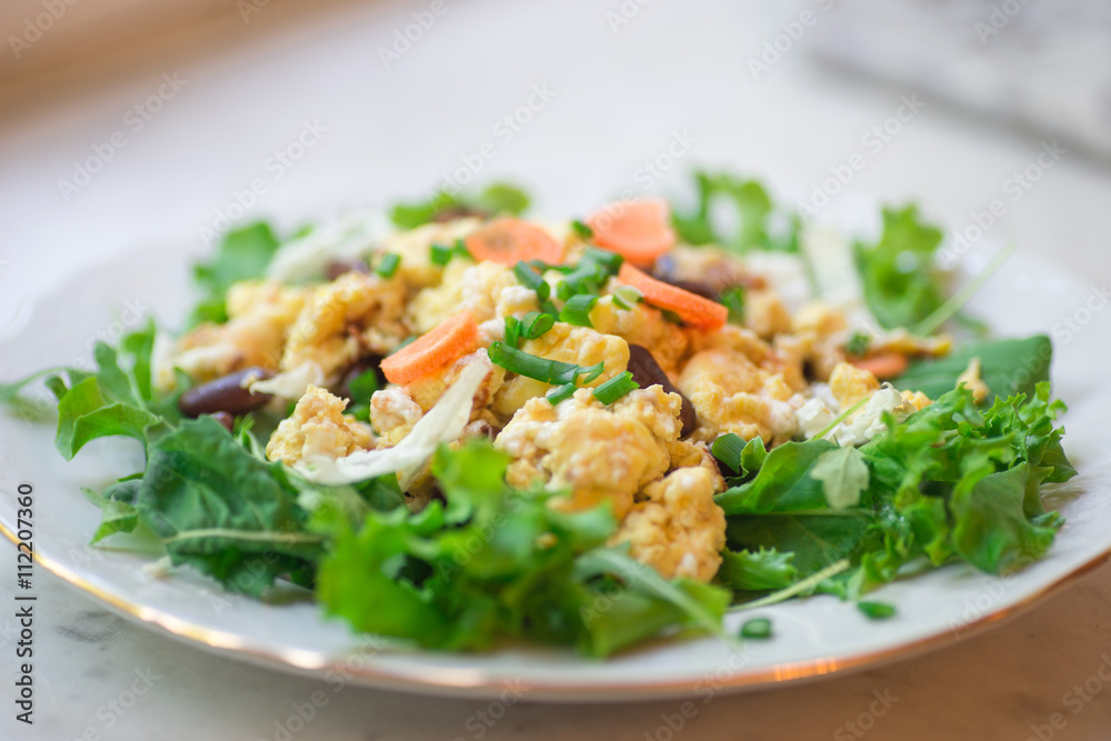 Vegetable omelet with mixed salad leafs