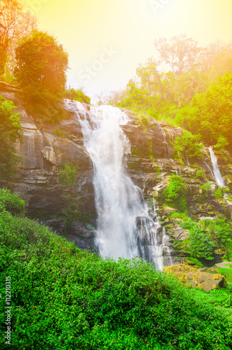 Beautiful waterfall with sunlight in autumn forest  Thailand