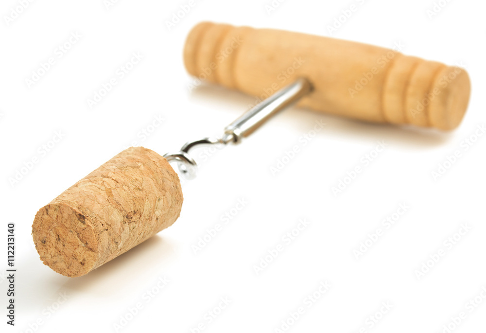 corkscrew and wine cork on white