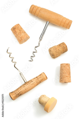 corkscrew and wine cork on white