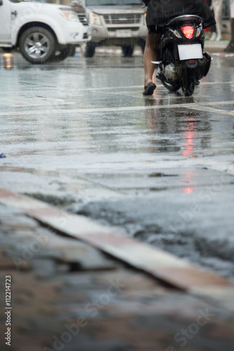 Wallpaper Mural Wet road and rainy day in the city.Blurry soft focus background. Torontodigital.ca