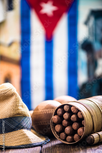 Photography straw hat, cigars and maracas in Cuba