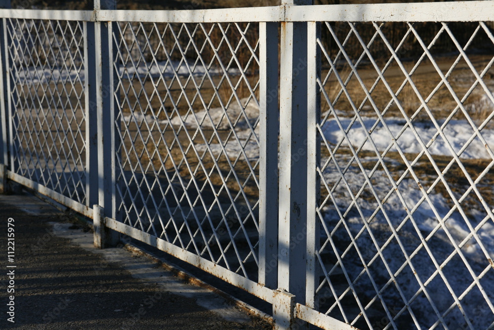 Fence of metal mesh. Fence of metal mesh.