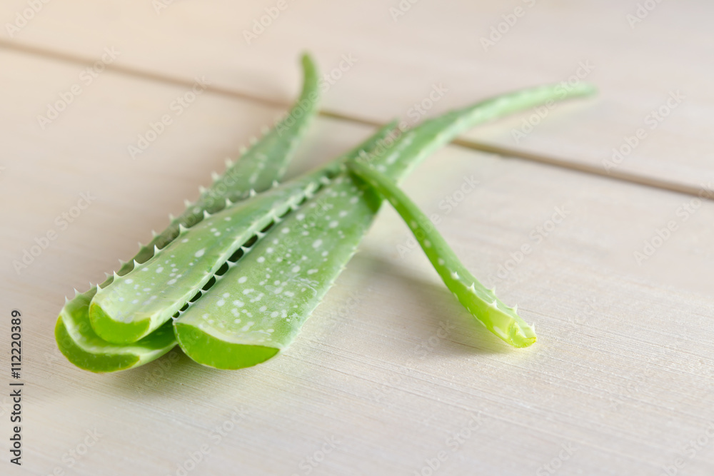 Aloe vera isolated on wooden board background Aloe vera isolated on wooden board background