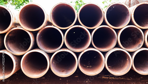 Steel pipes bunch in warehouse.