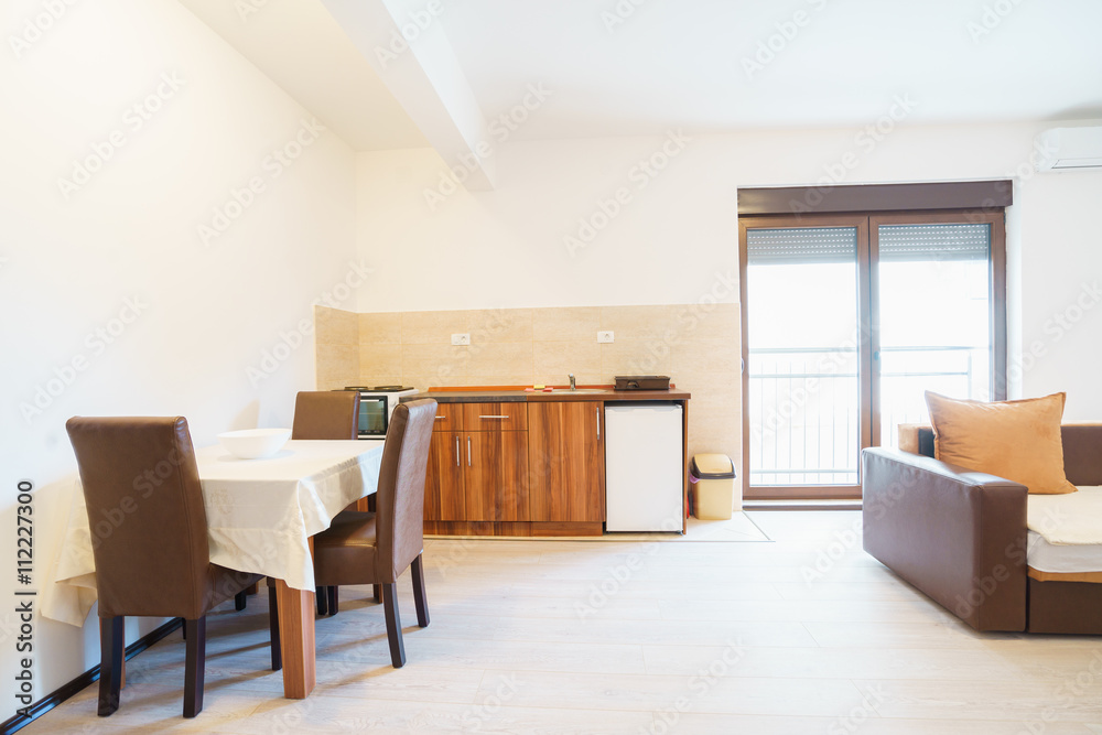 Fototapeta premium Interior of a guest house room with kitchen