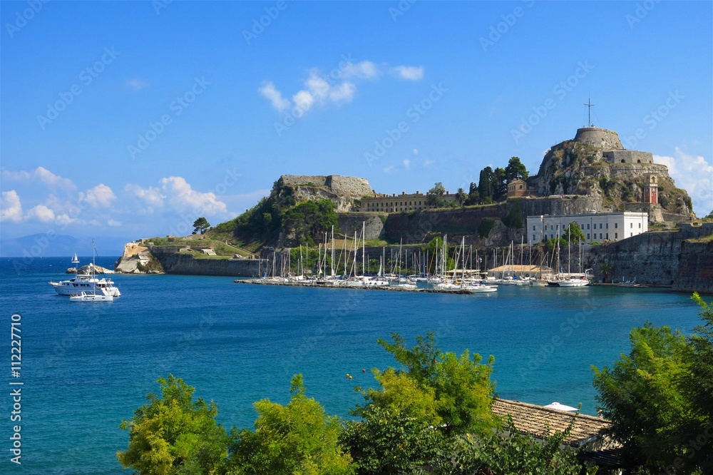 Naklejka premium Corfu Greece Old Fort marina with boats