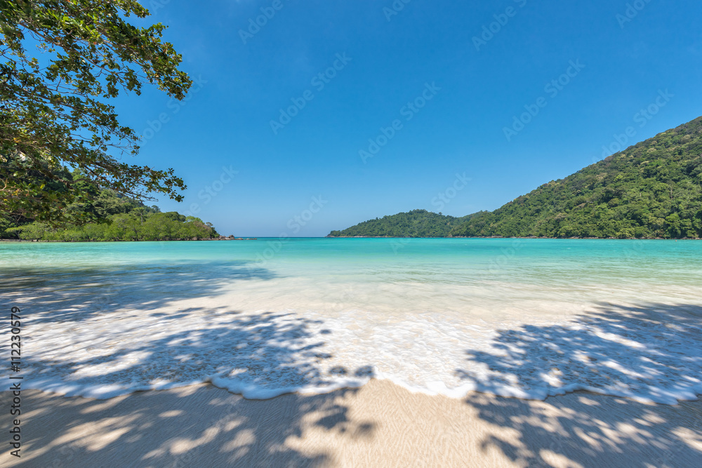 Beautiful beach and tropical sea, Wave of the sea on the sand beach Beautiful beach and tropical sea, Wave of the sea on the sand beach