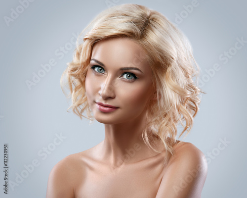 Beautiful blonde woman with eyeliner on her eyes