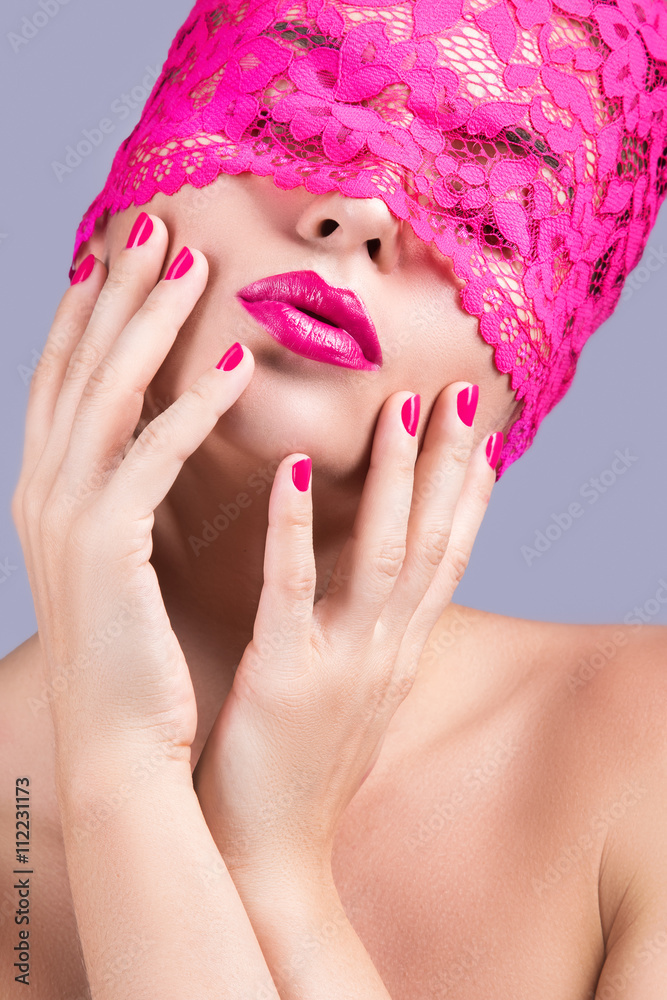 Fototapeta premium Beautiful woman with pink blindfold on her eyes
