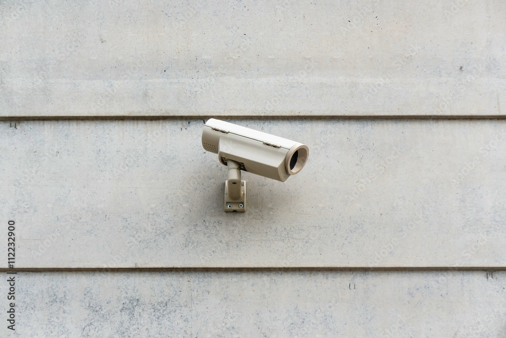 Close-up of security camera on building Close-up of security camera on building