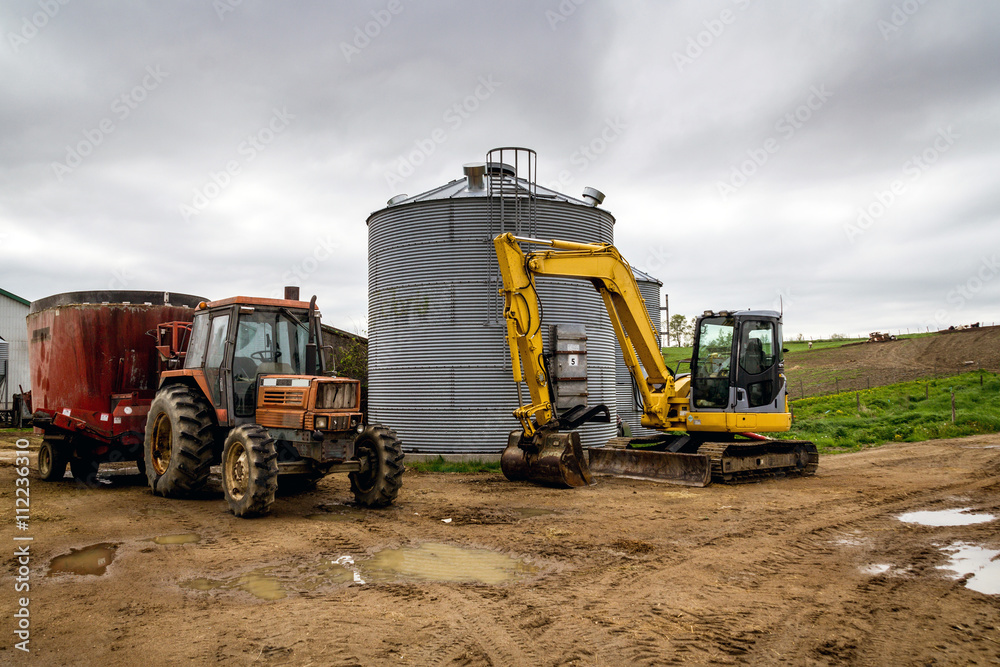 farming tractor and excavator
