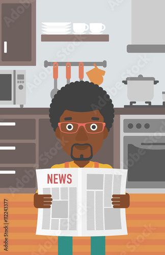 Man reading newspaper.