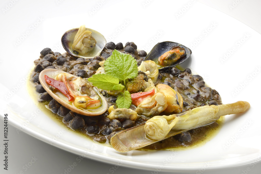 Blacks chickpea soup with seafood