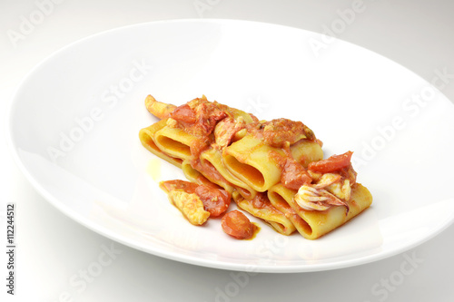 Dish of Paccheri pasta with seafood chowder sauce
