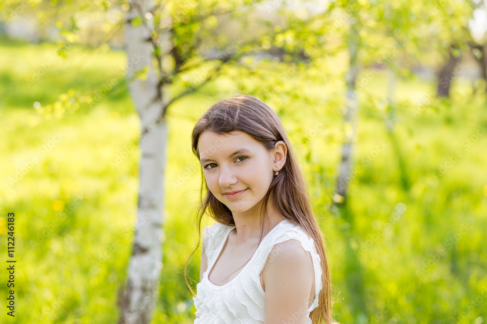 portrait of happy girl on nature in summer portrait of happy girl on nature in summer