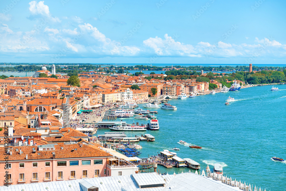 View from Campanile bell tower on boats and ships in Grand Canal