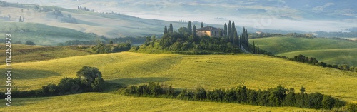 panoramic view to old villa in the morning in Tuscany in Italy
