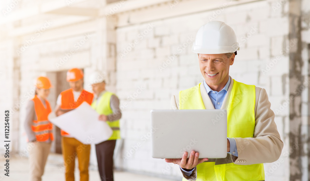 Business team. Building project Business team. Building project