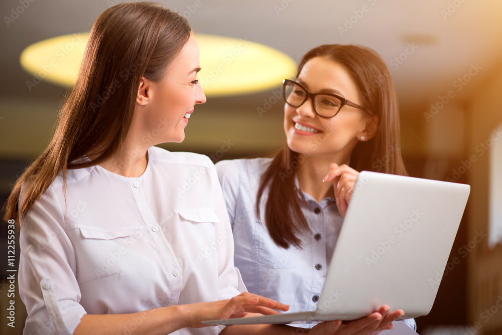 Positive colleagues talking with each other Positive colleagues talking with each other