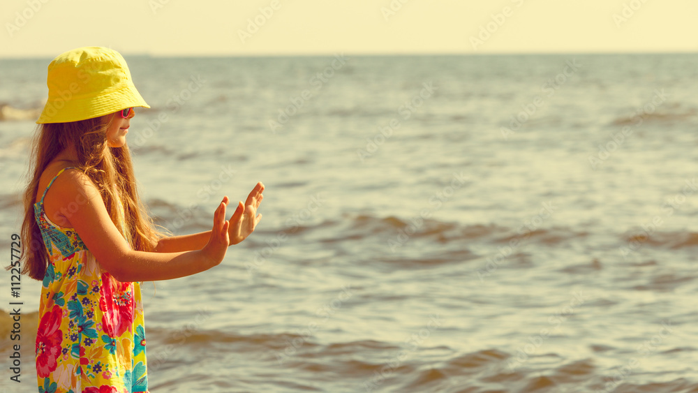 Girl having fun on beach.