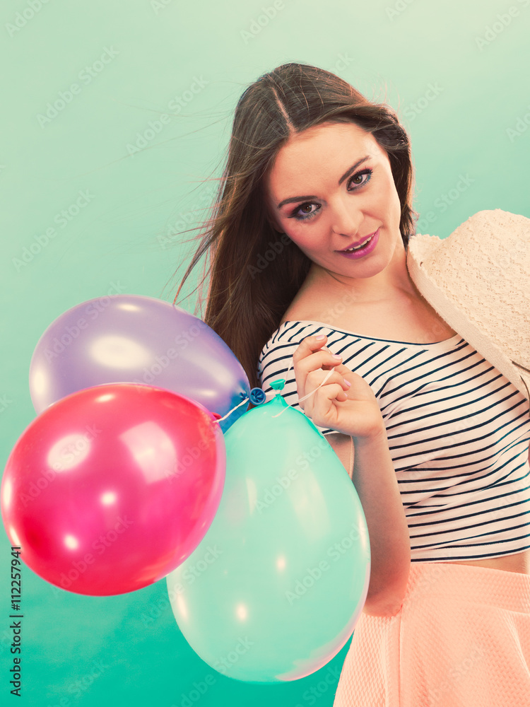 Happy girl playing with colorful balloons. Happy girl playing with colorful balloons.