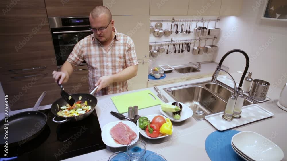 Man Pickles, Peppers and Prevents the Vegetables Man Pickles, Peppers and Prevents the Vegetables