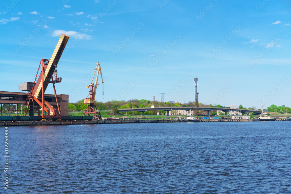 Ships and lifting cranes at the Marina in Ventspils Ships and lifting cranes at the Marina in Ventspils