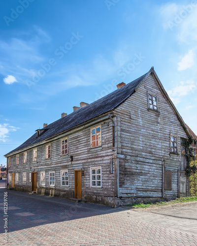 Old wooden house in the streets of Ventspils in Latvia