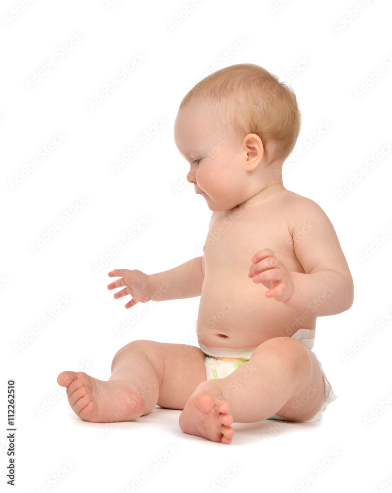 Infant child baby girl in diaper crawling happy smiling looking Infant child baby girl in diaper crawling happy smiling looking