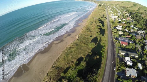 Aerial view of coastal neighborhood and scenic highway in Gisborne, New Zealand photo