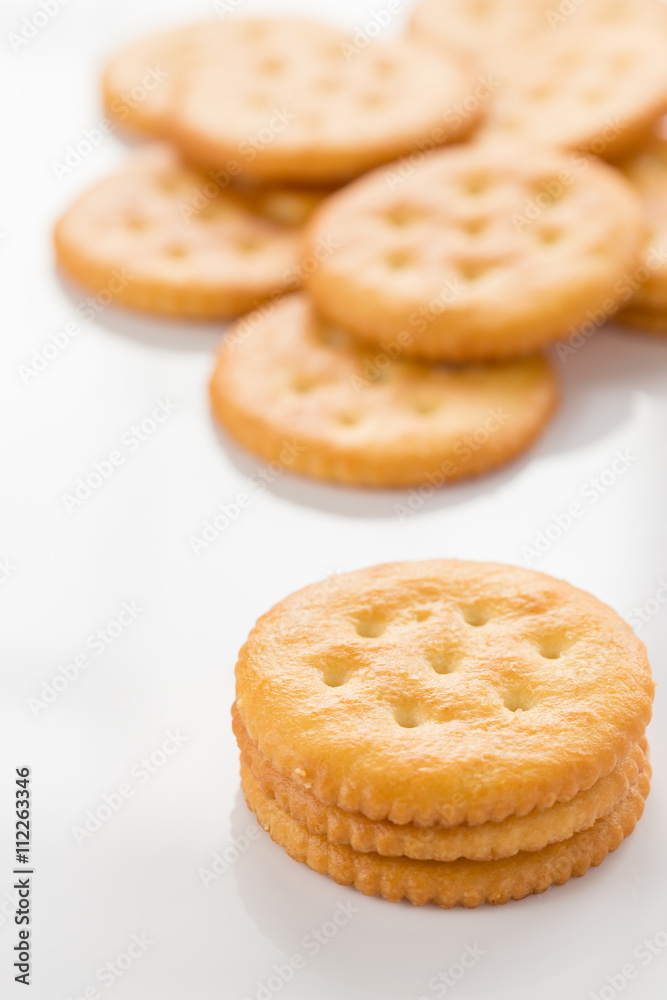 Salt cracker on isolated background with copy space. Salt cracker on isolated background with copy space.